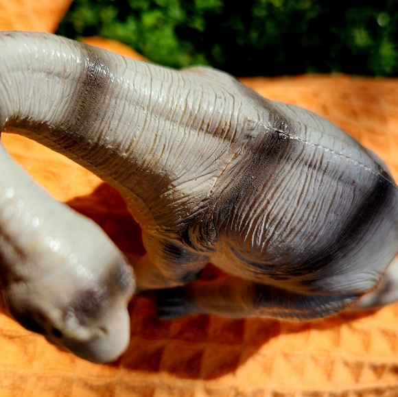 Apatosaurus Dinosaur, long plastic toy 7"L. Tan/Black - Picture 4 of 8